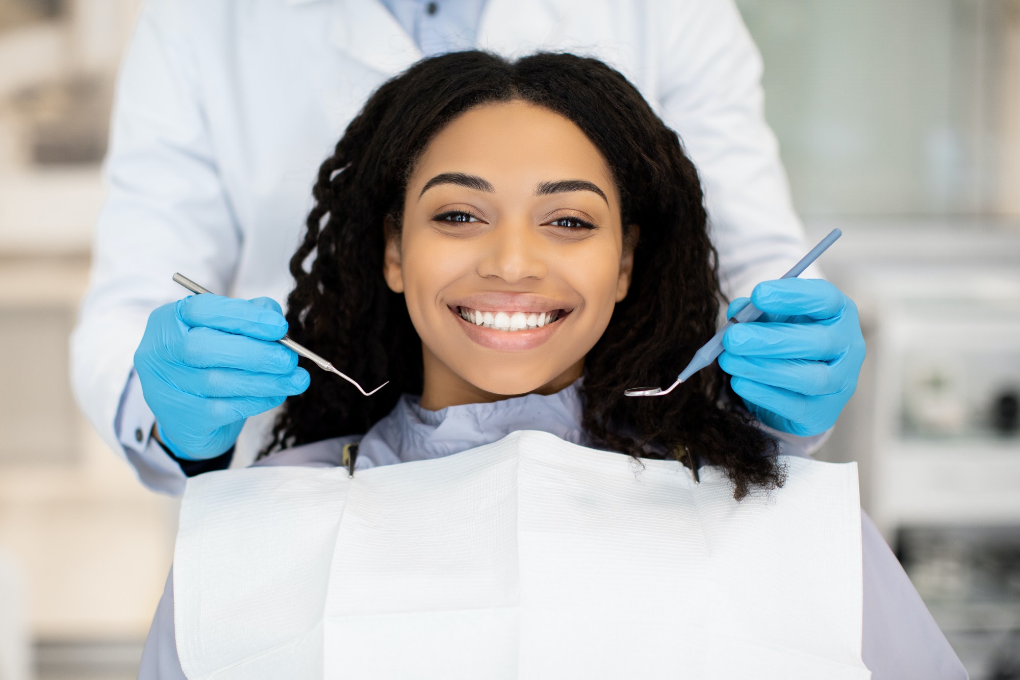 Portrait Of Happy Young Black Woman Having Check Up At Dental Clinic